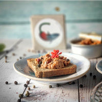 Spiced Mackerel Pâté on bread and plate